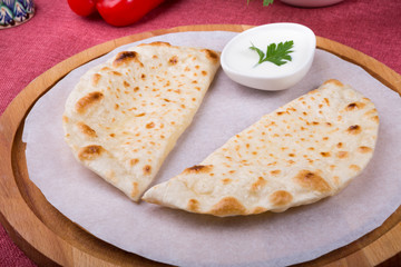 Traditional uzbek fried cheburek dough