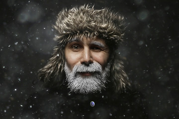 hipster santa claus winter portrait of a man with a beard / gray beard and mustache, christmas portrait guy