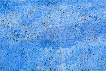 rough texture of a old blue wall.