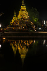  the ancient Buddhist temple of Wat Sa Si in evening twilight. Historical park of the Sukhothai, Thailand