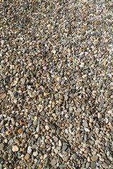 A lot of tiny stones, pebble, gravel, mix of colors