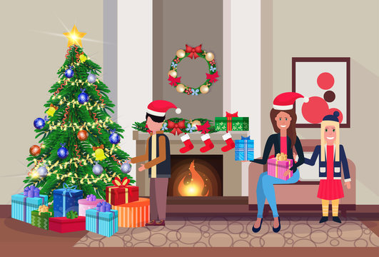 family decorate pine tree merry christmas happy new year living room fireplace home interior decoration winter holiday concept flat horizontal