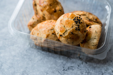 Salty Turkish Pastry with Dill / Pogaca in Plastic Container Box / Package.