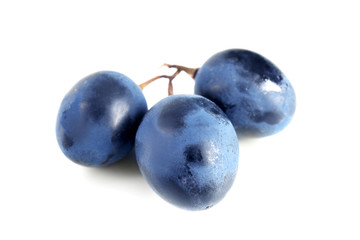 Ripe sweet grapes on white background