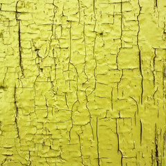 Background texture of cracked paint on wooden surface.