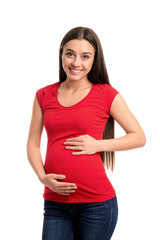 Fototapeta premium Beautiful pregnant woman on white background