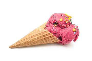 Waffle cone with delicious color ice cream and sprinkles on white background