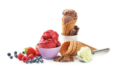 Delicious ice cream with waffle cones and berries on white background