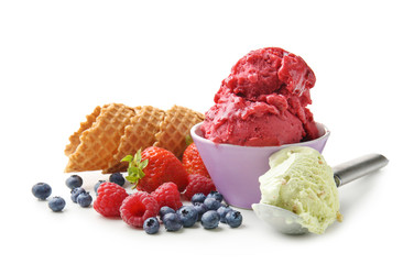 Delicious ice cream with waffle cones and berries on white background