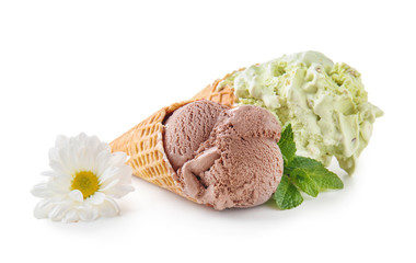 Waffle cones with delicious ice cream on white background