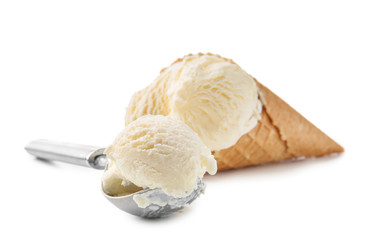 Waffle cone and scoop with delicious ice cream on white background