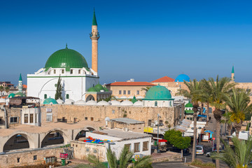 Fototapeta na wymiar Street scene and the Al Jazzar Mosque in the old city of Akko (Acre), Israel.