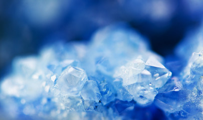 Winter beautiful background of beautiful  of blue crystals. Macro shooting