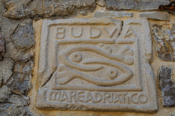 relief on a stone a symbol of fish Montenegro budva
