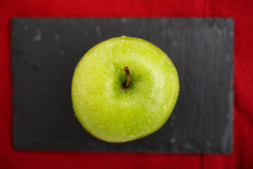 Green Apple and Red Napkin