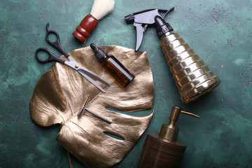 Barber accessories on color background, flat lay