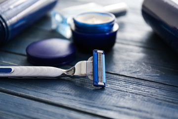 Razor on wooden table