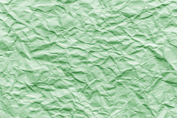 Texture of green wrinkled paper