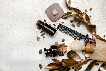 Composition with shaving accessories for men and cosmetics on white background