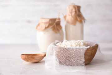 Bowl with cottage cheese on light table