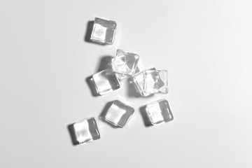 Naklejka premium Ice cubes on white background