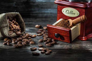 very close up view on coffe products  on vintage wood.