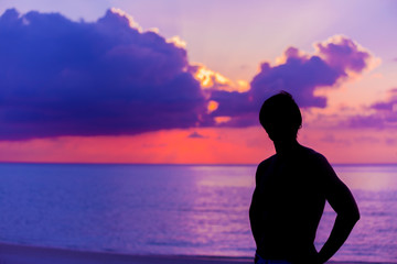 Silhouette of the Man looking at the Sunset. © Nemida