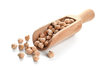 Scoop with dried chickpeas on white background