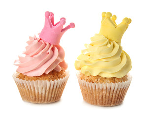 Delicious colorful cupcakes on white background