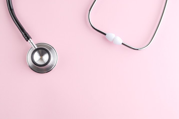 Stethoscope. Stethoscope on pink background. Traditional stethoscope - obrazy, fototapety, plakaty