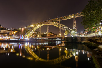 Fototapeta na wymiar Dom Louis Bridge over the Duoro River in Porto, Portugal cityscape