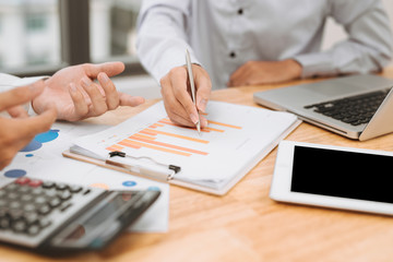 Businessman on online Financial Assessment. Team work in office