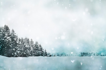 Snowfall in white winter landscape