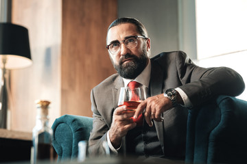 Man drinking alcohol on his own feeling lonely and nervous