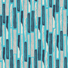 Vector seamless pattern. Torn paper decorated paint and ink spots. Different strips with rough ribbed and jagged edges. Grunge texture. Applique of scraps with stains. Wallpaper, wrapping, textile