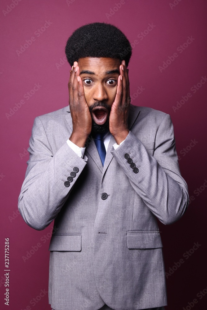 Canvas Prints Beautiful black man in front of a colored background