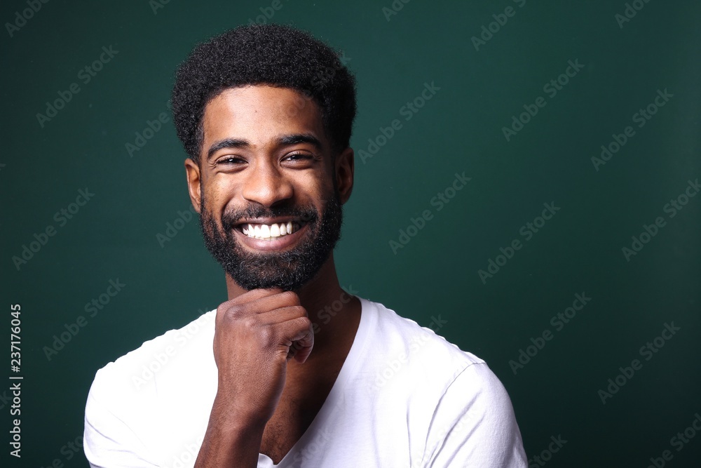 Canvas Prints Beautiful black man in front of a colored background