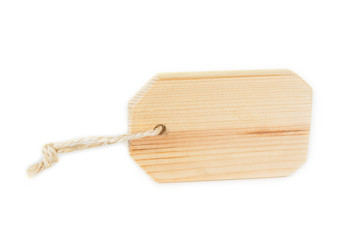 Wooden tag with a string on a white background