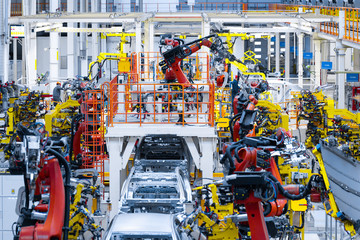 Automotive production line. Welding car body. Modern car Assembly plant