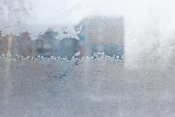 Frosty natural pattern on winter window.