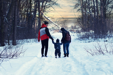 young couple walking in snow