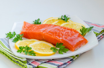 piece of raw salmon on a plate