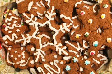 Gingerbread Christmas cookies decorated with white icing in the box