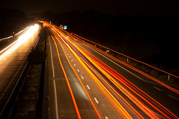 Fototapeta na wymiar Autobahn in der Nacht Streifen