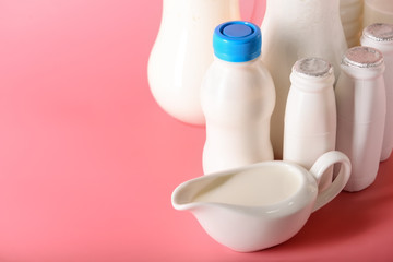 Different milk products on color background