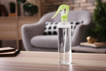 Air freshener on wooden table