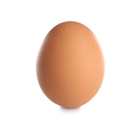 Raw brown chicken egg on white background