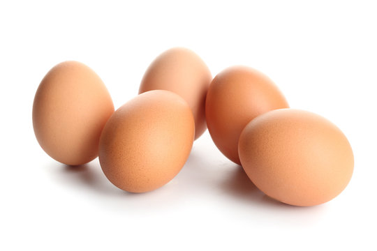 Raw Brown Chicken Eggs On White Background