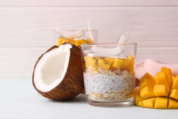 chia pudding with mango, coconut and granola. Proper nutrition, superfood. Healthy breakfast, dessert.