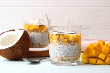 chia pudding with mango, coconut and granola. Proper nutrition, superfood. Healthy breakfast, dessert.